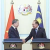 Tổng Bí thư Tô Lâm với Thủ tướng Malaysia Anwar Ibrahim tại buổi họp báo. (Ảnh: Thống Nhất/TTXVN)