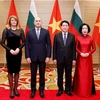 Chủ tịch nước Lương Cường và Phu nhân cùng Tổng thống Bulgaria Rumen Radev và Phu nhân dự tiệc chiêu đãi. (Ảnh: Lâm Khánh/TTXVN)