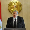 Thủ tướng Ai Cập Ibrahim Mahlab phát biểu trong buổi họp báo tại phủ Tổng thống ở thủ đô Cairo ngày 25/2. (Nguồn: AFP/TTXVN)