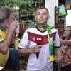 Phóng viên bị người hâm mộ Brazil quấy rối vì mặc áo tuyển Đức