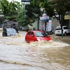 [Photo] Đường phố Sơn La biến thành sông sau trận mưa lớn