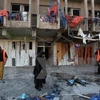 Hiện trường một vụ đánh bom liều chết tại Iraq. (Nguồn: AFP/TTXVN)