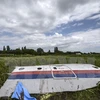 Mảnh vỡ máy bay MH17 gần làng Grabove, vùng Donetsk, miền Đông Ukraine. (Nguồn: AFP/TTXVN)