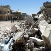 Cảnh đổ nát tại một làng ở Homs. (Nguồn: AFP)