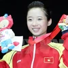 Dương Thúy Vi là người mở hàng vàng cho đội tuyển wushu Việt Nam ở SEA Games 28. (Ảnh: Quốc Khánh/TTXVN)