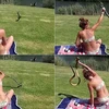 Cô gái bắt con rắn chỉ là cảnh dàn dựng. (Nguồn: YouTube)