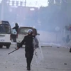 Cảnh sát Tunisia chống bạo động tại thành phố Kasserine. (Nguồn: Reuters)