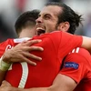 Gareth Bale ăn mừng bàn thắng lịch sử. (Nguồn: Getty)