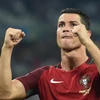 Cristiano Ronaldo vui mừng sau khi thực hiện thành công cú sút luân lưu đầu tiên cho đội Bồ Đào Nha. (Nguồn: AFP/ TTXVN)
