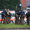 Cảnh sát đặc nhiệm được triển khai tại trung tâm thương mại ở Munich sau vụ xả súng. (Nguồn: AFP/TTXVN)