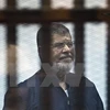 Cựu Tổng thống Mohamed Morsi tại phiên tòa xét xử ở Cairo. (Nguồn: AFP/TTXVN) 