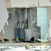 Hiện trường vụ án dùng chất nổ phá máy ATM để cướp 260.000 ringgit. (Nguồn: Bernama)