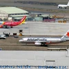 Các hãng hàng không Việt Nam tại sân bay Tân Sơn Nhất. (Ảnh: Hoàng Hải/TTXVN)