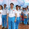 Đoàn Thể thao Việt Nam tại buổi lẽ thượng cờ. (Ảnh: Quốc Khánh/TTXVN)
