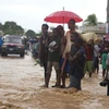 Người dân ở Leogane, Haiti đối phó với ảnh hưởng của cơn bão Matthew. (Nguồn: AP)