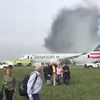 Hiện trường vụ cháy máy bay tại sân bay quốc tế O'Hare ngày 28/10. (Nguồn: EPA/TTXVN)
