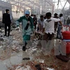 Hiện trường sau một vụ không kích ở Sanaa. (Nguồn: EPA/TTXVN)