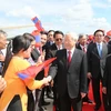 Lễ đón Tổng Bí thư Nguyễn Phú Trọng tại sân bay quốc tế Vientiane. (Ảnh: Trí Dũng/TTXVN)