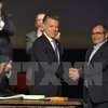 Tổng thống Colombia Juan Manuel Santos (trái) và thủ lĩnh tối cao FARC Timoleon Jimenez. (Nguồn: AFP/TTXVN)