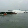 Hiện trường chìm phà chở khách Sewol cách đây hơn 2 năm. (Nguồn: AFP/TTXVN)