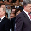Tổng thống Ukraine Petro Poroshenko (phải) và người đồng cấp Nga Vladimir Putin. (Nguồn: telegraph.co.uk)