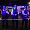 Cảnh sát Anh phong tỏa hiện trường vụ xe tải lao vào đám đông gần công viên Finsbury ngày 19/6. (Nguồn: EPA/TTXVN)