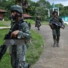 Binh sỹ Philippines tuần tra tại Marawi, Mindanao trong chiến dịch chống phiến quân Hồi giáo ngày 18/6. (Nguồn: AFP/TTXVN)