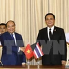 Thủ tướng Nguyễn Xuân Phúc và Thủ tướng Thái Lan Prayut Chan-o-cha. (Ảnh: Thống Nhất/TTXVN)