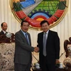Thủ tướng Campuchia Samdech Techo Hun Sen (trái) và Thủ tướng Lào Thongloun Sisulith. (Nguồn: pressocm.gov.kh)