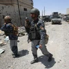 Lực lượng Iraq tuần tra tại Mosul. (Ảnh: AFP/TTXVN)