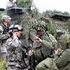 Binh sỹ Mỹ và Litva tham gia một cuộc tập trận tại căn cứ quân sự Rukla ở Litva. (Nguồn: AFP/TTXVN)