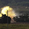 Binh sĩ Belarus trên xe tăng T-72 tham gia cuộc diễn tập quân sự ở Alabino, ngoại ô Moskva, Nga, ngày 12/8. (Nguồn: EPA/TTXVN)