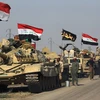 Các lực lượng Iraq tiến vào ngoại ô phía nam thành phố Kirkik. (Nguồn: AFP/TTXVN)
