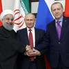 Tổng thống Iran Hassan Rouhani, Tổng thống Nga Vladimir Putin và Tổng thống Thổ Nhĩ Kỳ Recep Tayyip Erdogan tại Hội nghị thượng đỉnh ba bên về Syria ở Sochi (Nga) ngày 22/11. (Nguồn: AFP/TTXVN)