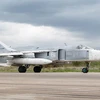 Máy bay tấn công Su-24 tại căn cứ không quân Khmeimim, Syria. (Nguồn: Sputnik)