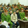 Bị cáo Trịnh Xuân Thanh và đồng phạm tại phiên tòa. (Ảnh: An Đăng/TTXVN)