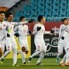 Các cầu thủ U23 Việt Nam ăn mừng sau chiến thắng lịch sử trưởng U23 Qatar. (Nguồn: The AFC.com) 