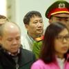 Bị cáo Trịnh Xuân Thanh và các đồng phạm nghe tòa tuyên án. (Ảnh: An Đăng/TTXVN)