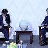 Tổng thống Hàn Quốc Moon Jae-in (phải) và Thủ tướng Nhật Bản Shinzo Abe tại cuộc gặp ở PyeongChang ngày 9/2. (Nguồn: YONHAP/TTXVN)