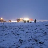 Lực lượng thuộc Bộ tình trạng khẩn cấp Nga làm nhiệm vụ tại hiện trường vụ rơi máy bay ở ngoại ô Moskva ngày 11/2. (Nguồn: THX/TTXVN)