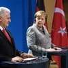 Thủ tướng Thổ Nhĩ Kỳ Binali Yildirim (trái) và người đồng cấp Đức Merkel. (Nguồn: AFP/TTXVN)