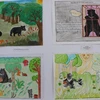 Những bức tranh ấn tượng của các em học sinh tham dự cuộc thi vẽ tranh bảo vệ gấu. (Ảnh: H.V/Vietnam+)