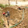 Vấn nạn khai thác vàng trái phép diễn ra rầm rộ tại các huyện miền núi tỉnh Quảng Nam. (Ảnh: PV/Vietnam+)