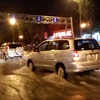 Cảnh báo một số tuyến đường bị ngập nặng ở nội thành Hà Nội. (Ảnh: Hùng Võ/Vietnam+)