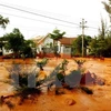 Sự cố vỡ hồ chứa nước đãi titan tại Bình Thuận. (Nguồn ảnh: TTXVN)