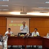 Trứ trưởng Bộ Tài nguyên và Môi trường Lê Công Thành (đứng giữa) chủ trì buổi họp báo. (Ảnh: Hùng Võ/Vietnam+)