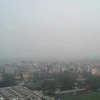 Chất lượng không khí tại thành phố Hà Nội sáng nay, 2/2, được cảnh báo phổ biến ở ngưỡng không tốt cho sức khỏe. (Ảnh: Hùng Võ/Vietnam+)