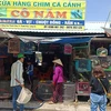 Hoạt động buôn bán động vật hoang dã diễn ra phổ biến ở chợ nông sản Thạnh Hóa, tỉnh Long An. (Ảnh: H.V/Vietnam+)