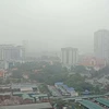 Chất lượng không khí tại thành phố Hà Nội sáng nay, 11/2, được cảnh báo phổ biến ở ngưỡng không tốt cho sức khỏe. (Ảnh: Hùng Võ/Vietnam+)