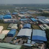 Hàng chục doanh nghiệp xây dựng nhà xưởng trong khu đất quy hoạch cụm công nghiệp Phước Tân chưa được cấp phép. (Ảnh: Sỹ Tuyên/TTXVN)